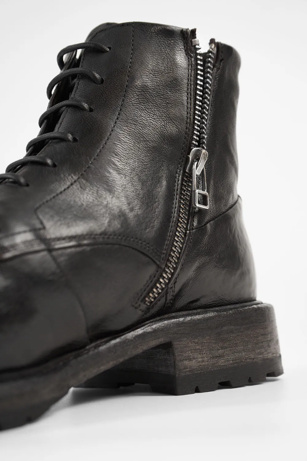 ROWLEY coal-black folded lace up boots.