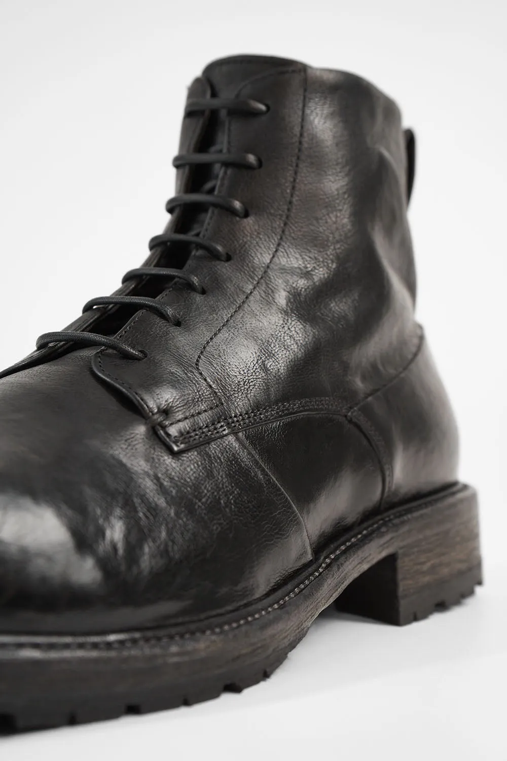 ROWLEY coal-black folded lace up boots.